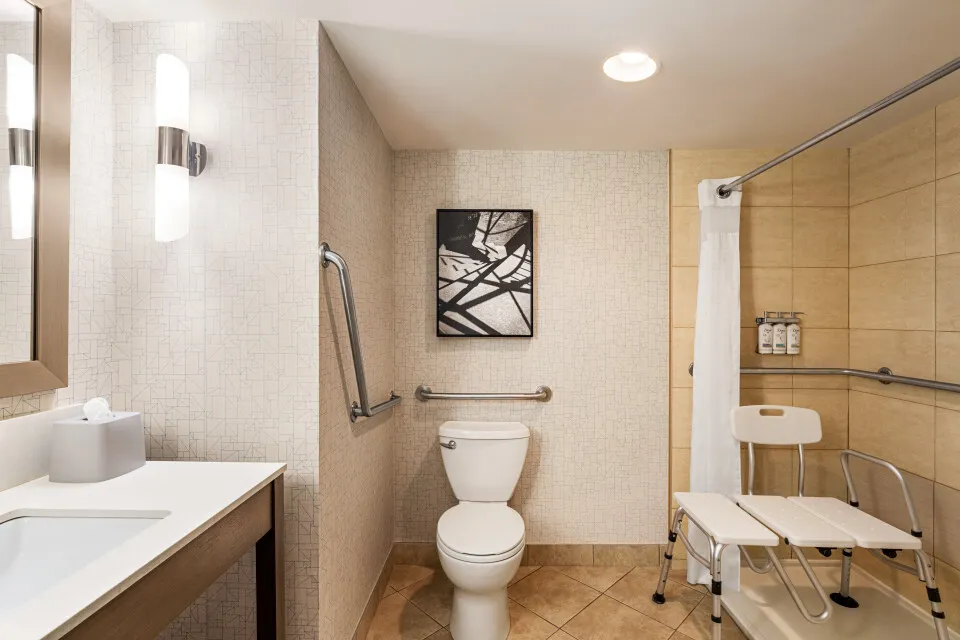Holiday Inn Metrotown — Guestrooms & Corridors — Accessible Bathroom Roll in Shower